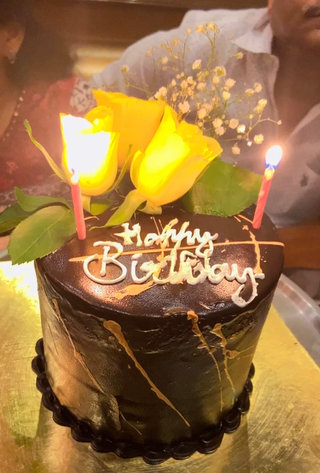Chocolate Cake With Yellow Blooms