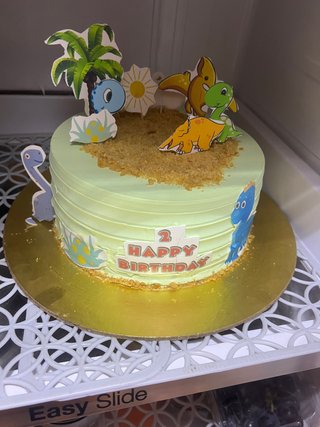 Vibrant Dinosaur Theme Cake