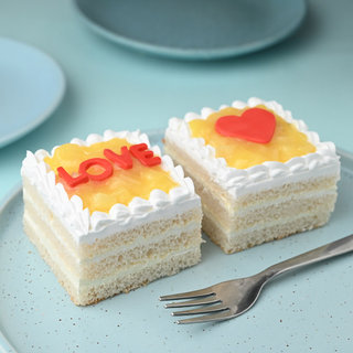 Side View of Love Blooms With Pineapple Pastry