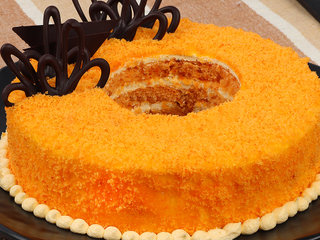 Zoomed View of Donut Like Orange Cake N Chocolate Topping