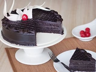 Sliced View of Delectable Truffle - Round Chocolate Truffle Cake Sliced View of Delectable Truffle - Round Chocolate Truffle Cake