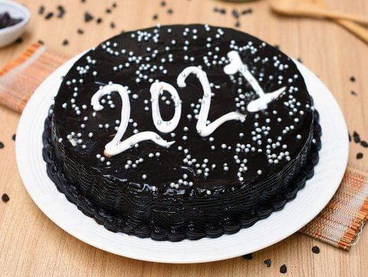 Buy vanilla fruit cake-vibrant vanilla cake Buy New Year Chocolate Cake-2021 Tasty Feast