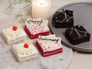 Side View of Six Pineapple Chocolate and Red Velvet Anniversary Pastries