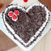 Top View of Heart Shaped Black Forest Cake with Choco Flakes Toppings