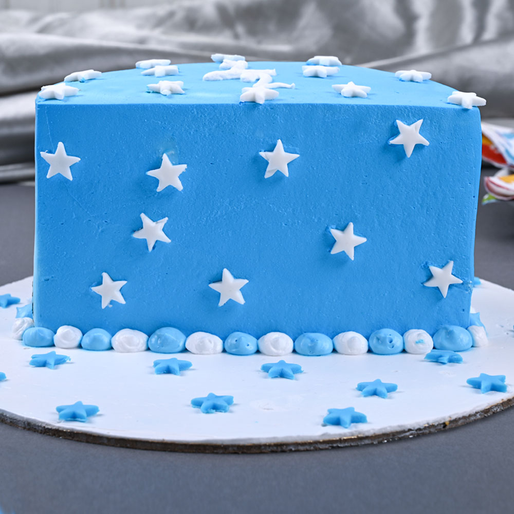 Free Photo | A top view blue birthday cake with flower on top on the pink  desk celebration party birthday
