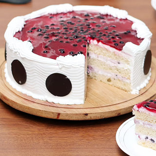 Sliced View of Chopped Blueberries N Blueberry Puree Round Cake