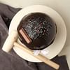 Smashing Ferrero Rocher and Kitkat Pinata Ball Cake