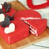 Sliced View of Heart Shaped Red Velvet Cake
