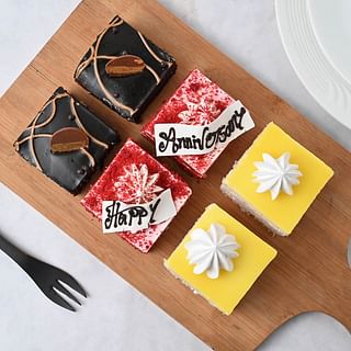 Top View of Six Pineapple Chocolate and Red Velvet Anniversary Pastries
