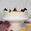 Side View of Vanilla Cake With Cherry
