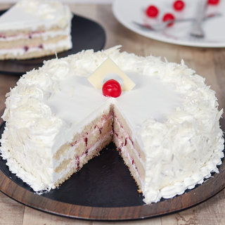 Cutted Creamy White Forest Cake