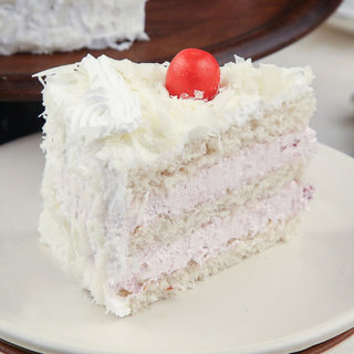 Sliced View of White Paradesia - A White Forest Cake