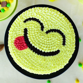 Top View of Yellow Smiley Cream Cake