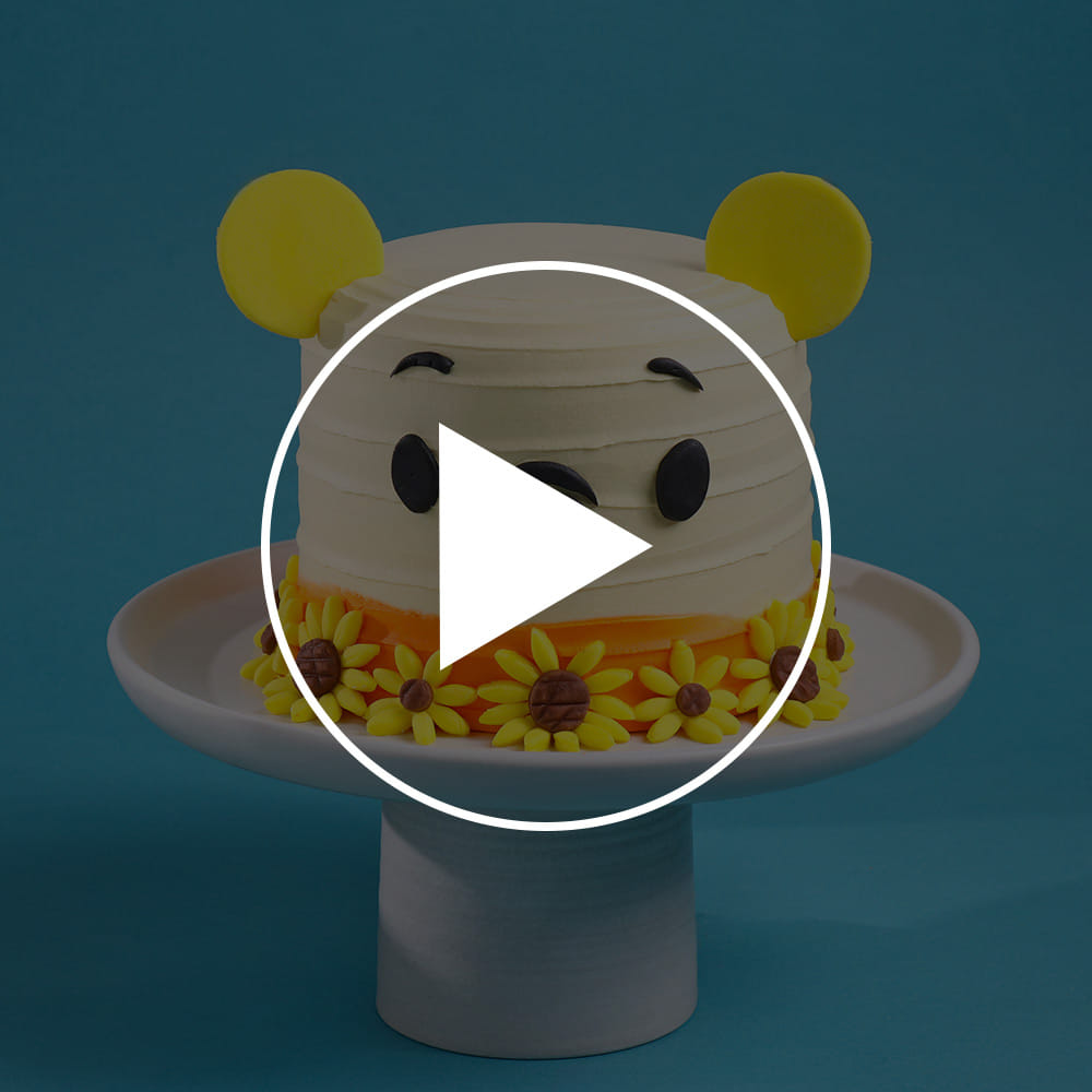 Sunny Blooms Pooh Cake