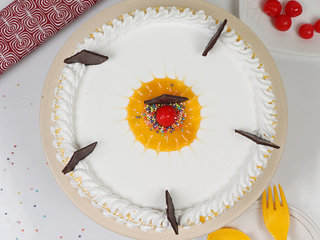 Top View of Vanilla Cake With Cherry